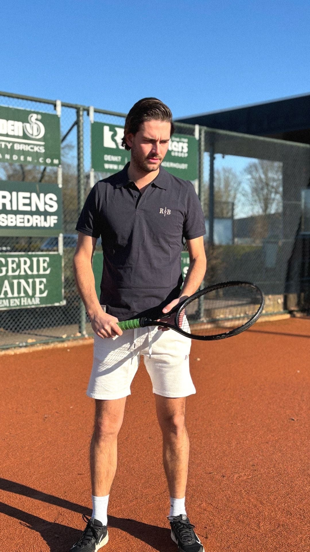 Donkerblauw tennispolo shirt